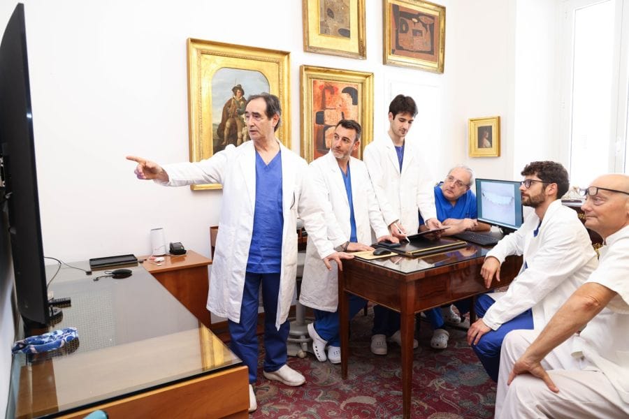 Dr. Priamo Mura con team